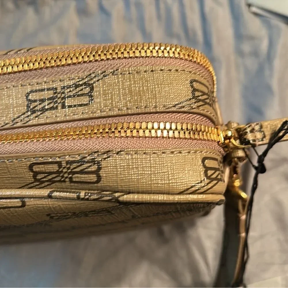 Authentic Balenciaga Signature BB Leather Pouch.